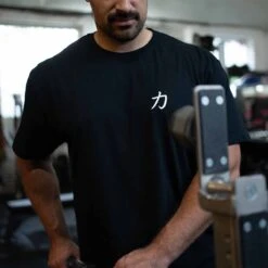 Strength Wear Logo T-Shirt V3 – Chikara -Strength Shop SHIRT STRENGTHSHOP LOGO ACTIONSHOT 1