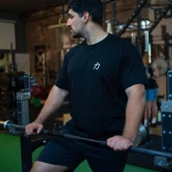 Strength Wear Logo T-Shirt V3 – Chikara -Strength Shop SHIRT STRENGTHSHOP LOGO ACTIONSHOT 2