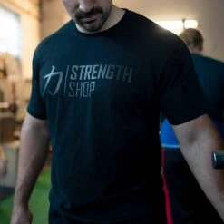 Strength Wear Logo T-Shirt V3 – All Black -Strength Shop SHOP SHIRT LOGO V3 ALLBLK ACTIONSHOT 2
